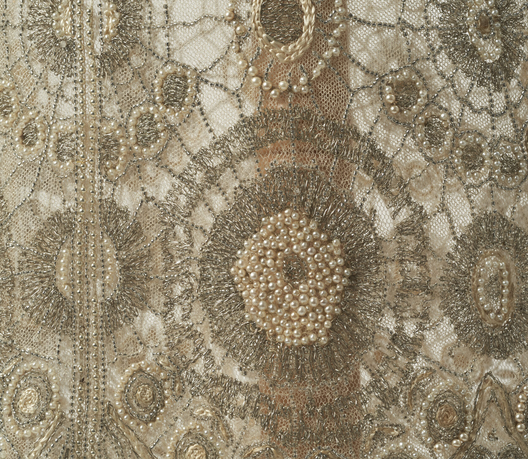 Beaded 1920s flapper dress with a bead and pearl design that resembles spider webs, RSN Collection, COL.22.